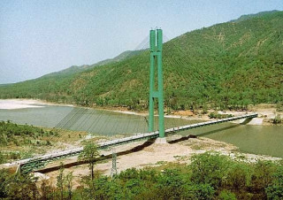 कर्णाली चिसापानी जलविद्युत् आयोजना निर्माण कति सम्भव छ ?