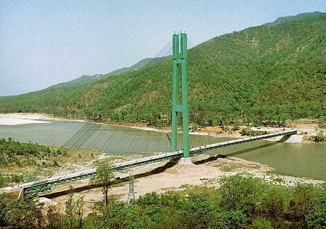 कर्णाली चिसापानी जलविद्युत् आयोजना निर्माण कति सम्भव छ ?